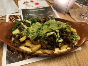 Loaded fries with Champignons and Avocado Cream 🥑  at Zeil Kitchen in Frankfurt