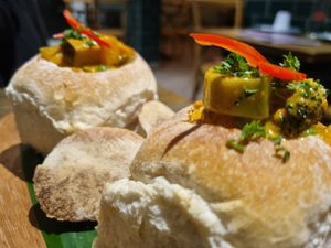 RED CURRY BUNNY CHOW at Little Turtle in Enmore