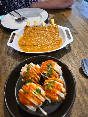 Red curry arancini balls & tofu satay skewers at Little Turtle in Enmore