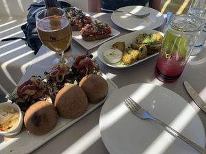 Pulled pork, bruschetta, and potatoes at Katharos Lounge in Santorini