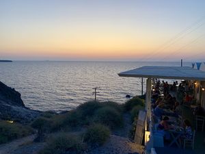 Katharos beach and restaurant on the right at Katharos Lounge in Santorini