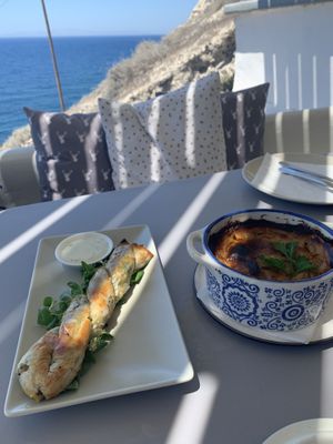 The spinach cheese roll and moussaka at Katharos Lounge in Santorini