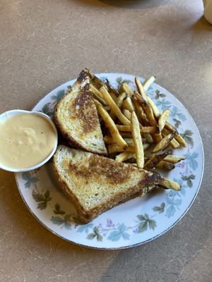 Tempeh “tuna” melt with a side of cheese dip for my fries  at Thrive Diner in Pittsfield