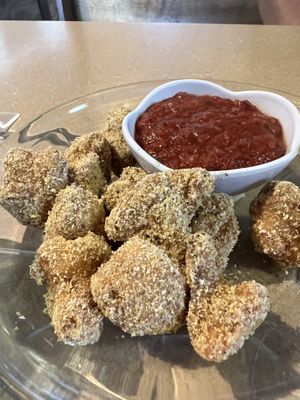 Almond parm cauli nuggets & marinara sauce  at Thrive Diner in Pittsfield