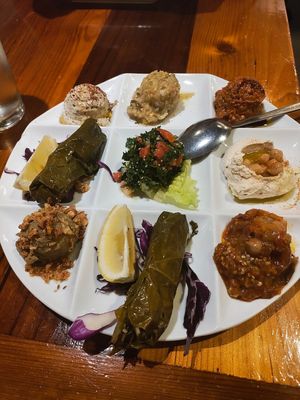 Chef Rachid Platter: hummus, babaganoush, tabouli, grape leaves, eggplant salad, moussaka, mujadara, mujamarra at Kareem's in Naples
