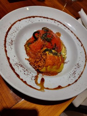 Stuffed vegetables: roasted peppers stuffed with bulgur, tomato sauce & mint sauce was yum! at Kareem's in Naples