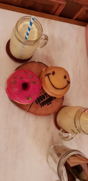 Raspberry pistachio and smiling mango (both vegan) at Good Town Doughnuts in Tokyo