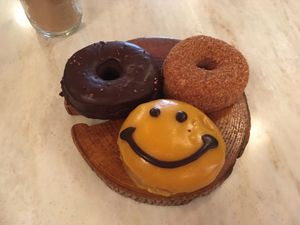 Chocolate glaze, mango glaze and toasted coconut at Good Town Doughnuts in Tokyo