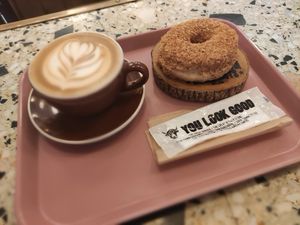 Oatmilk latte & toasted coconut donut at The Little Bakery in Tokyo
