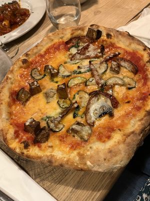 ORTOLANA pizza 
Tomato base, mozzarella, courgettes, aubergine, mixed peppers and basil  at Posillipo - Broadstairs in Broadstairs