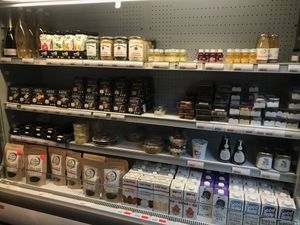 Health shots, pickles, vegan cheese, vegan raw desserts, plant milk, dates, meals, etc. at Unlimited Health in Amsterdam