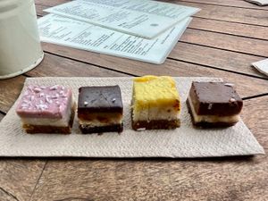 A selection of delicious vegan raw cheesecakes (Vegan Food Tour July 2025) at SUE Bakery in Rotterdam