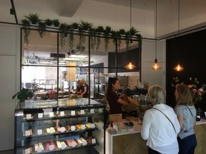 Counter with window to the bakery at SUE Bakery in Rotterdam