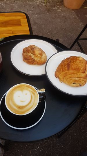 Awesome oat cappuccino and half a cinnamon bun and pain au chocolat (had to share with the other half)... delicious food and very lovely service. Recommended at Deep Coffee Roaster in Marseille