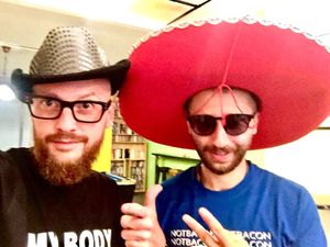 Trying on hats in the game room at Luna's Kitchen in Beirut