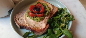 Avocado and hummus toast at Plantate Cafe in Madrid
