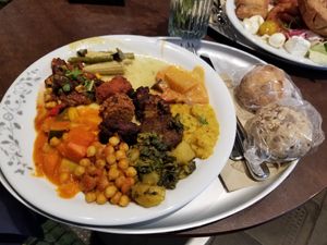 Red lentils, green curry, red curry, falafel, potatoes w/ spinach, GF bread... at HILTL - Sihlstrasse in Zurich