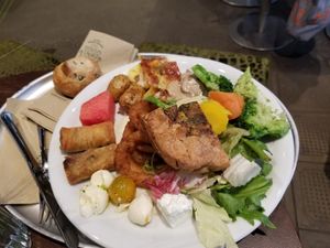 My friend's dinner - Broccoli, carrots, potatoes, spring rolls, cheese balls... at HILTL - Sihlstrasse in Zurich