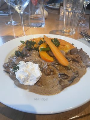 A vegan mushroom and seitan stew with fried potatoess  at HILTL - Sihlstrasse in Zurich