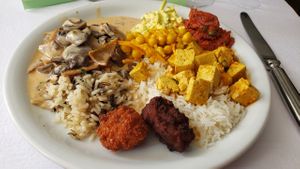 My plate from Hiltl. Not sure what everything is...Züri Geschnetzeltes, channa, tofu egg salad, eggplant based pate, Asian tofu with vegetables, wild rice and jasmine rice. at HILTL - Sihlstrasse in Zurich