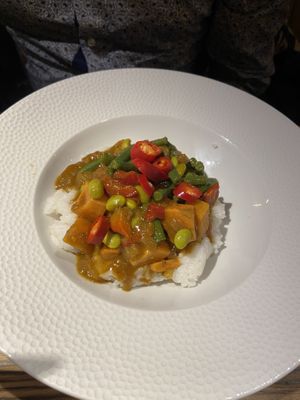 Vegan sweet potato curry. The only heat was from the chillis and it was super tasty. We got a portion of chips to share.  at The Cromwell Cottage in Kislingbury