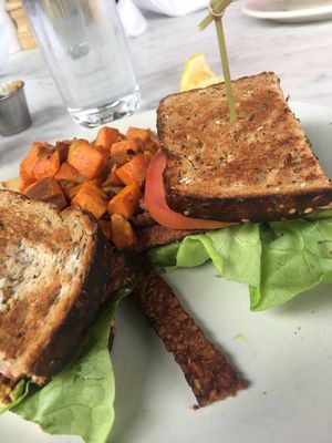 T.L.T sandwich with tempeh and vegan mayonnaise, side of sweet potato hash at True Food Kitchen in The Woodlands