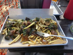 Veggie Italian on fries with chimichurri   at Bangers & Brews in Bend