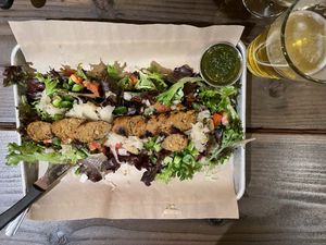 Banger on a tasty salad and a beer!   at Bangers & Brews in Bend