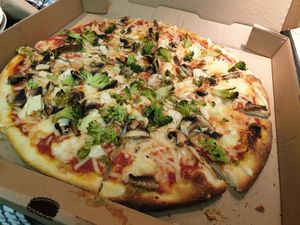 Vegan pizza with garlic mushrooms broccoli at Setti's in Lake Worth