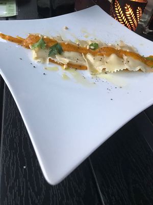 Vegan ravioli with pumpkin and potato sauce. at La Bussola in West Singapore