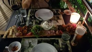 Platter with wine and beer at La Bussola in West Singapore