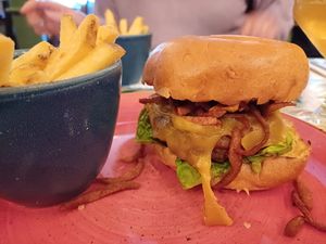 Vegan cheezeburger with added facon & fries at Lounges - Montero Lounge in Melton Mowbray