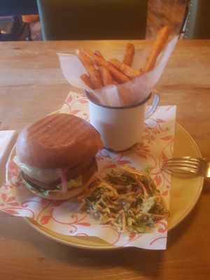 Vegan beyond cheese burger,with sweet potato fries, and slaw . Tastes so good at Lounges - Montero Lounge in Melton Mowbray