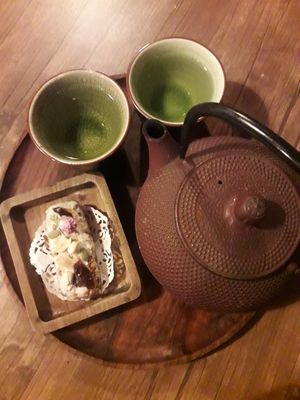 Chocolate bar and tea pot at Manipura Ethic Cafe & Bar in Baku