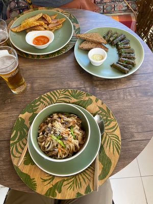 Dolma, Noodles with Mushrooms and vegetables, and Fries  at Manipura Ethic Cafe & Bar in Baku