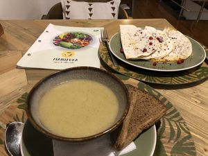 Broccoli soup and kutabs with pumpkin and spinach   at Manipura Ethic Cafe & Bar in Baku