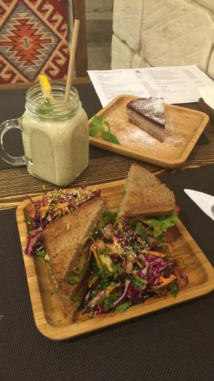 On First Time, cheesecake, smoothie & Manipura Sandwich. at Manipura Ethic Cafe & Bar in Baku