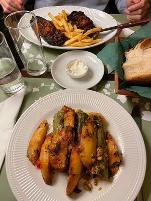 Aubergines cooks in the oven and stuffed courgette with potatoes at Oikeio in Athens