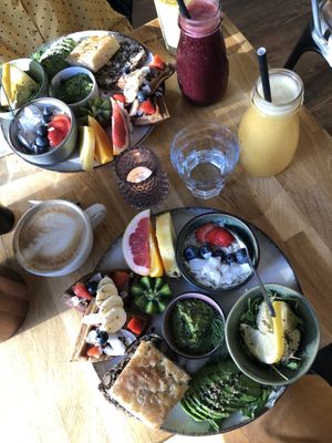 Vegan brunch, cappucino and two different fresh juices.  at Cafe Oha  in Frederiksberg