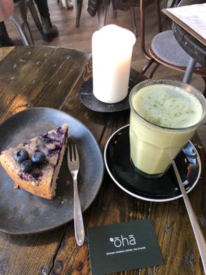 Moringa latte and blueberry vegan cake  at Cafe Oha  in Frederiksberg