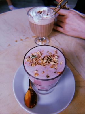 Rose latte, hot chocolate in background at Kattakaffihusid in Reykjavik