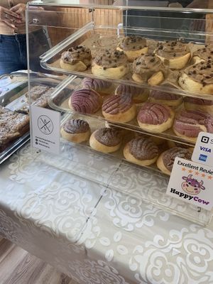 Chocolate and raspberry conchas; classic and mocha chip cinnamon rolls. at Baked Vegan in Port Chester