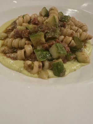 Riccioli saltati in padella con dadolata di zucchine alla menta, capperi, olive e pomodori secchi su purè fresco di zucchine  at La Luce in Vicenza