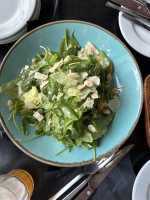 Green salad with arugula, baby spinach, orange and pistachio   at Korova in Athens