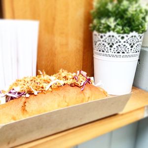 Porklyke dog with BBQ sauce and slaw at Vegano - Food Truck in Newcastle Upon Tyne