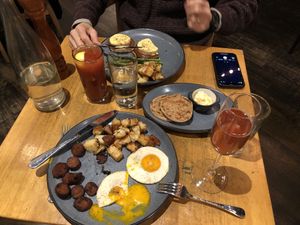 Eggs and sausage/Eggs Benedict with Bloody Mary’s   at Blossom Restaurant on Columbus in New York City