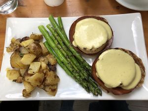 Tofu florentine with hollandaise sauce and seitan bacon, asparagus and potatoes at Blossom Restaurant on Columbus in New York City
