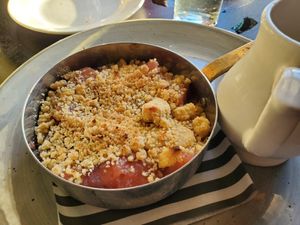 Apple and damson crumble with vegan custard at The Plough Inn in Dartford