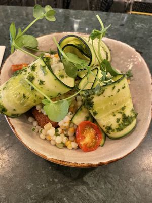 Roasted zucchini with puffed buckwheat, smoked tofu and pearl couscous  at Waku Waku in Utrecht