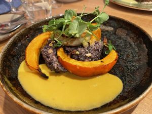 Pumpkin and candied artichaut on black rice  at Waku Waku in Utrecht